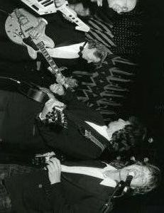 Mick Jagger, George Harrison, Dave Edmunds 1988 NY.jpg